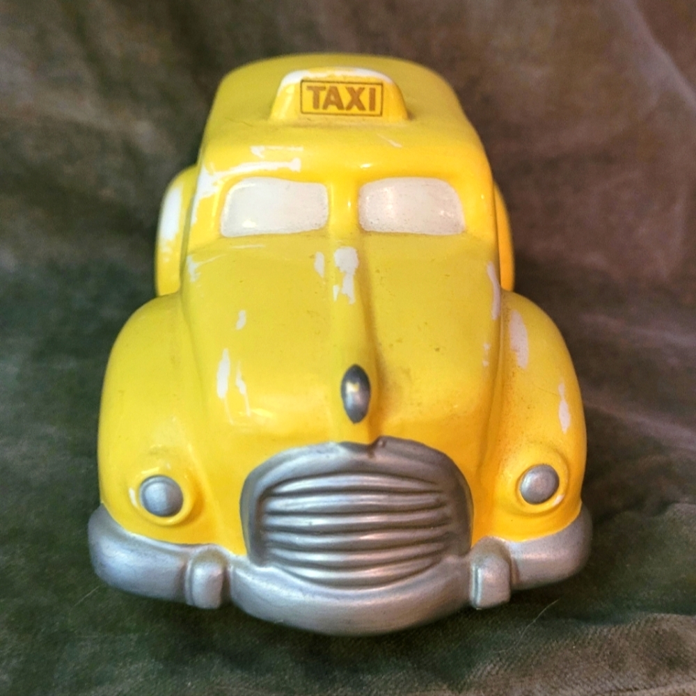 Vintage art deco inspired yellow New York taxi piggy bank